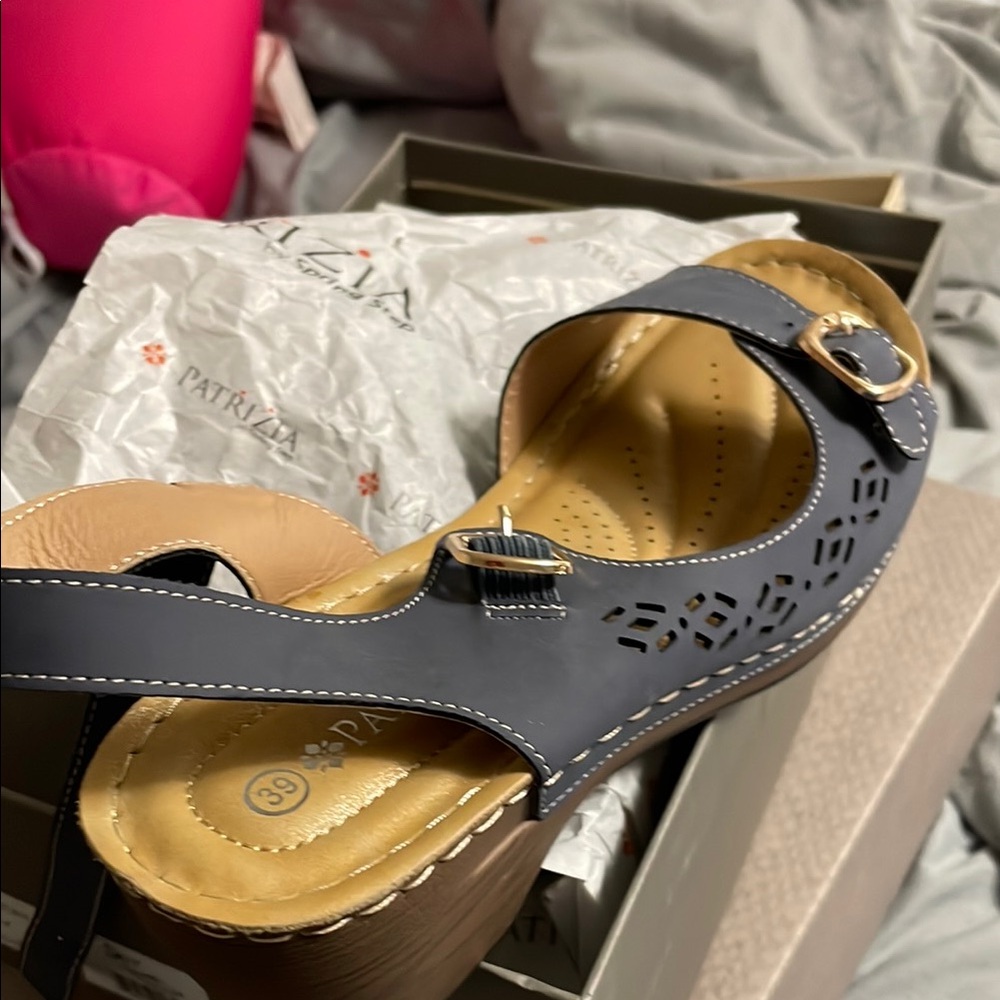 Black and Tan Sandals with Intricate Cut-Out Design